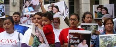 Roxana Santos and other immigrant women demand justice. 