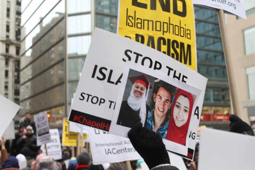 Hundreds of protesters march in front of Fox News and CNN offices for their coverage of the Chapel Hill, NC shootings.