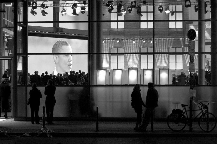 Obama on screen for audience