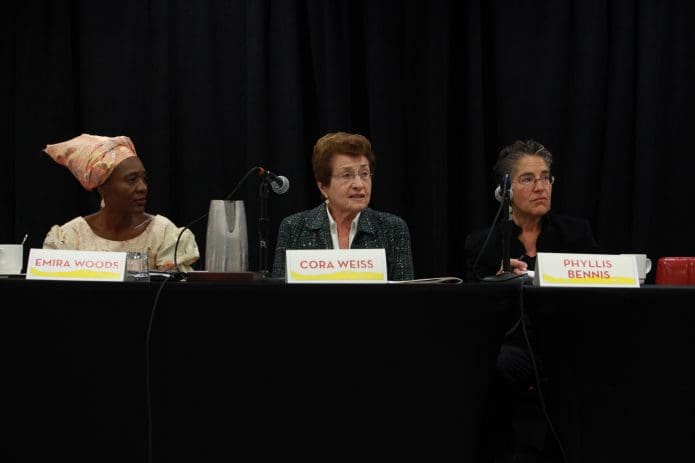 Cora Weiss (center) speaks on a panel at IPS's 50th anniiversary celebration with Emira Woods (left) and Phyllis Bennis (right). (Photo by Rick Reinhard for IPS)