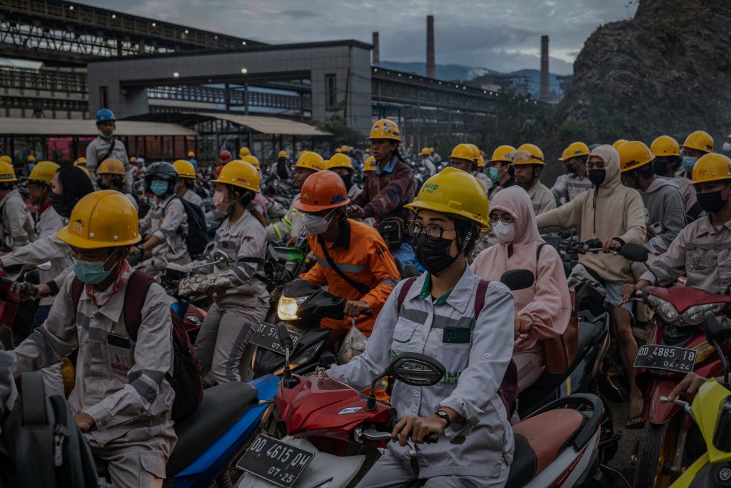 Workers arriving for their shift at the Indonesia Morowali Industrial Park, Sulawesi, Indonesia.