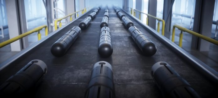 Illustration: Military rockets roll off an assembly line. (Shutterstock)